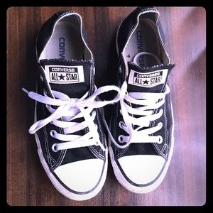 Converse. Black. Women’s size 7. Men’s size 5.